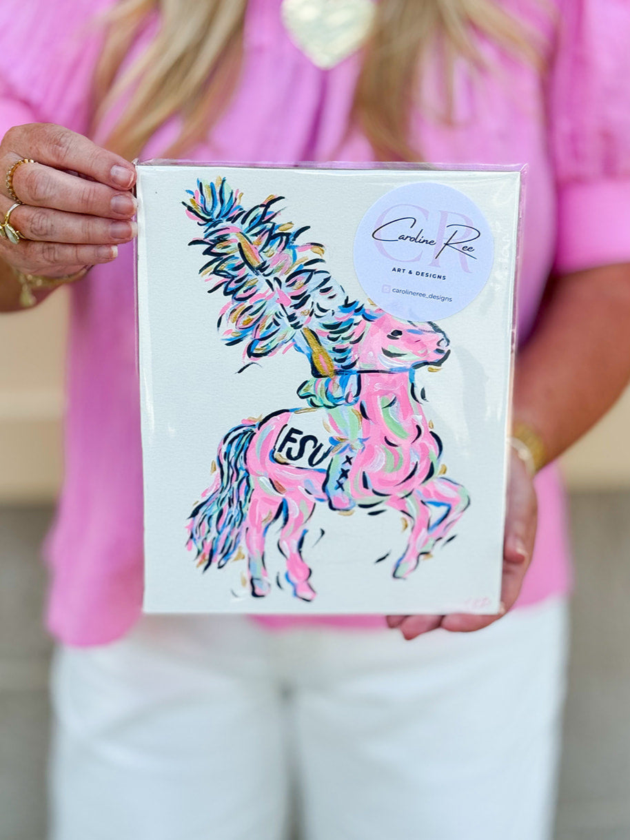 A vibrant hand-painted 8"x10" canvas featuring a stylized Renegade mascot in bright pink, gold, and blue by Caroline Ree Designs.
