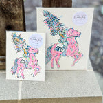 A vibrant hand-painted 8"x10" canvas featuring a stylized Renegade mascot in bright pink, gold, and blue by Caroline Ree Designs.