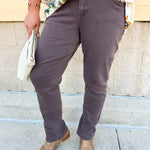 Mocha brown slim straight leg jeans with mid rise and full inseam.