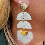 Cream and gold tassel earrings with hammered gold stud, acrylic demi circles, and feather tassel.