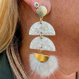Cream and gold tassel earrings with hammered gold stud, acrylic demi circles, and feather tassel.