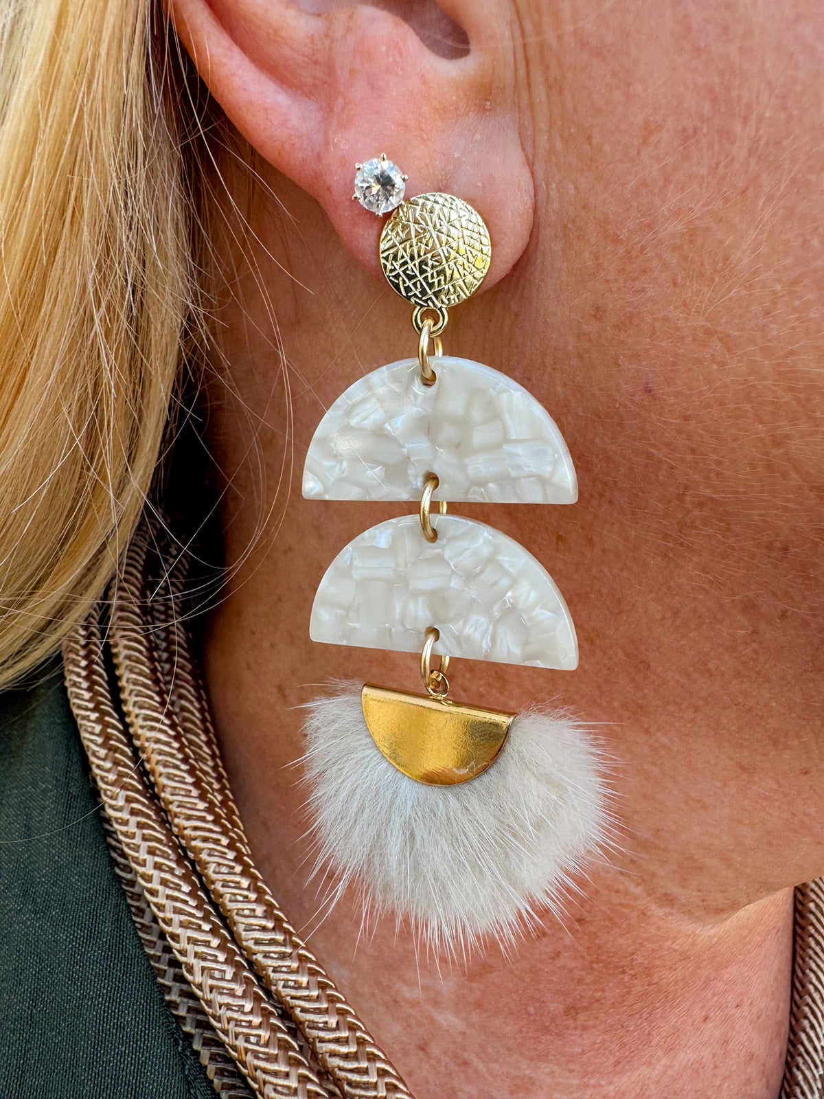 Cream and gold tassel earrings with hammered gold stud, acrylic demi circles, and feather tassel.
