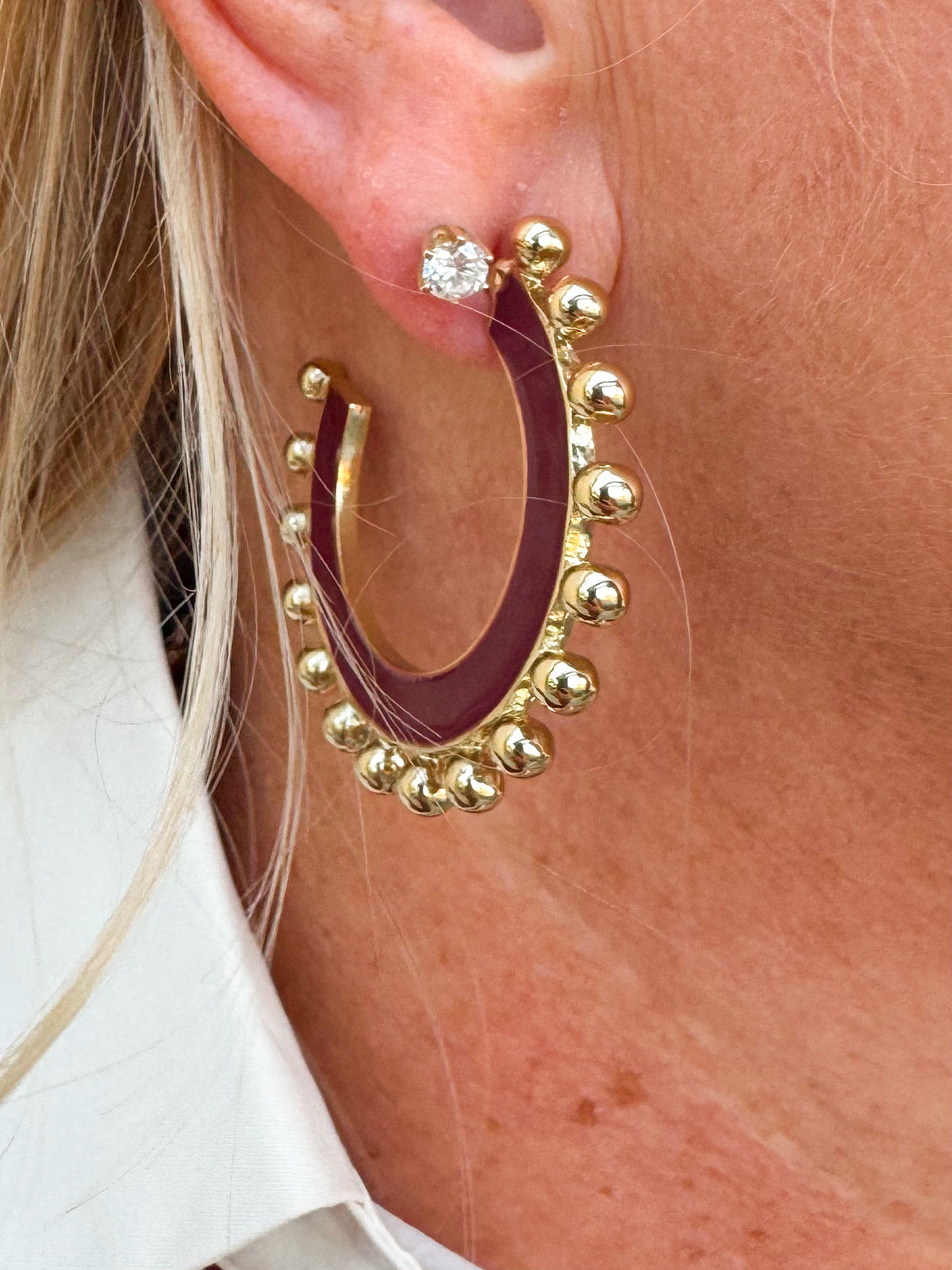 Garnet and gold enamel earrings with gold-plated finish and surgical steel posts.