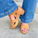 Minimalist open-toe block heel sandal with synthetic upper and adjustable ankle strap—elegant and easy to wear