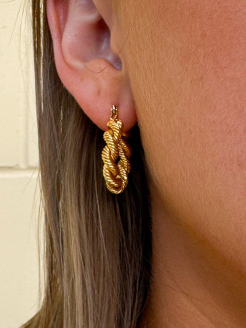 Gold double hoop earrings with twisted rope design and sterling silver posts—medium size, tarnish-resistant and hypoallergenic
