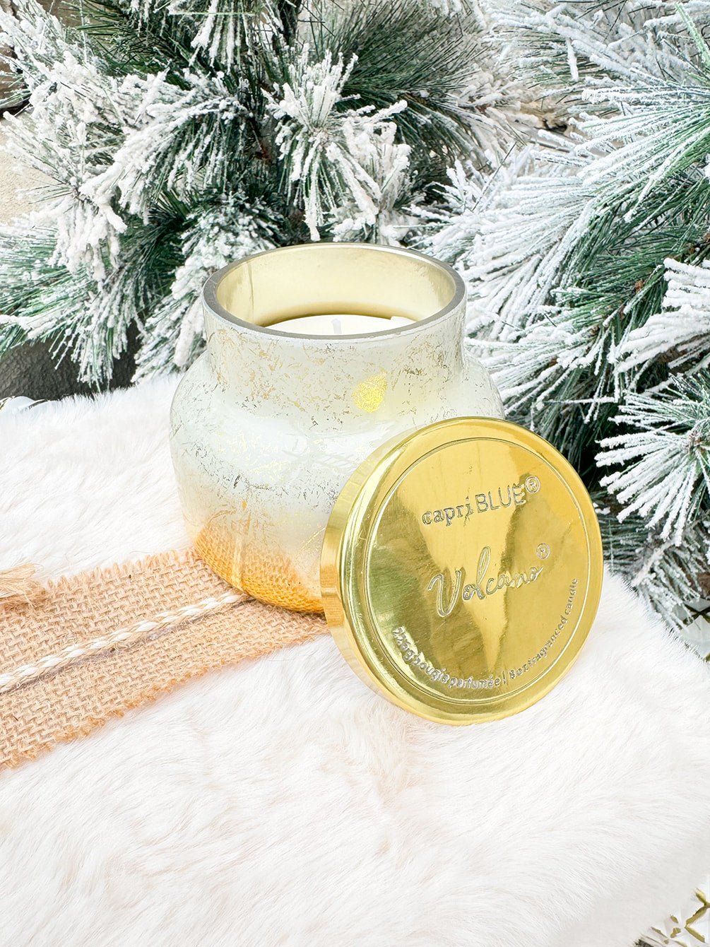 Winter white holiday candle with gold detailing