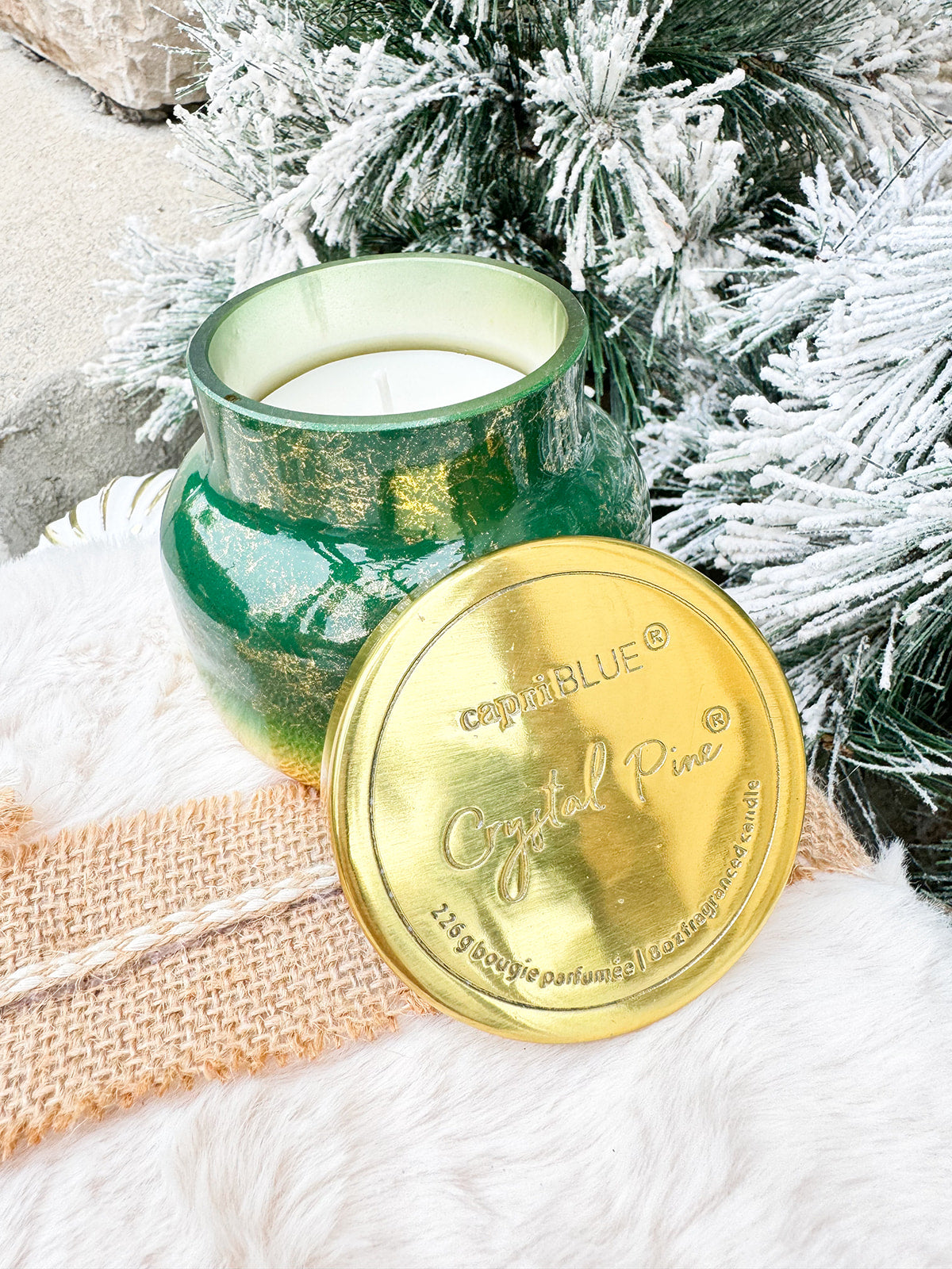 Green ombré gold candle jar, Capri Blue Glimmer Crystal Pine scent.