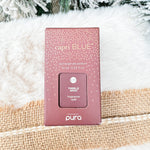 Capri Blue Tinsel & Spice Pura Diffuser Refill bottle with red and gold label.