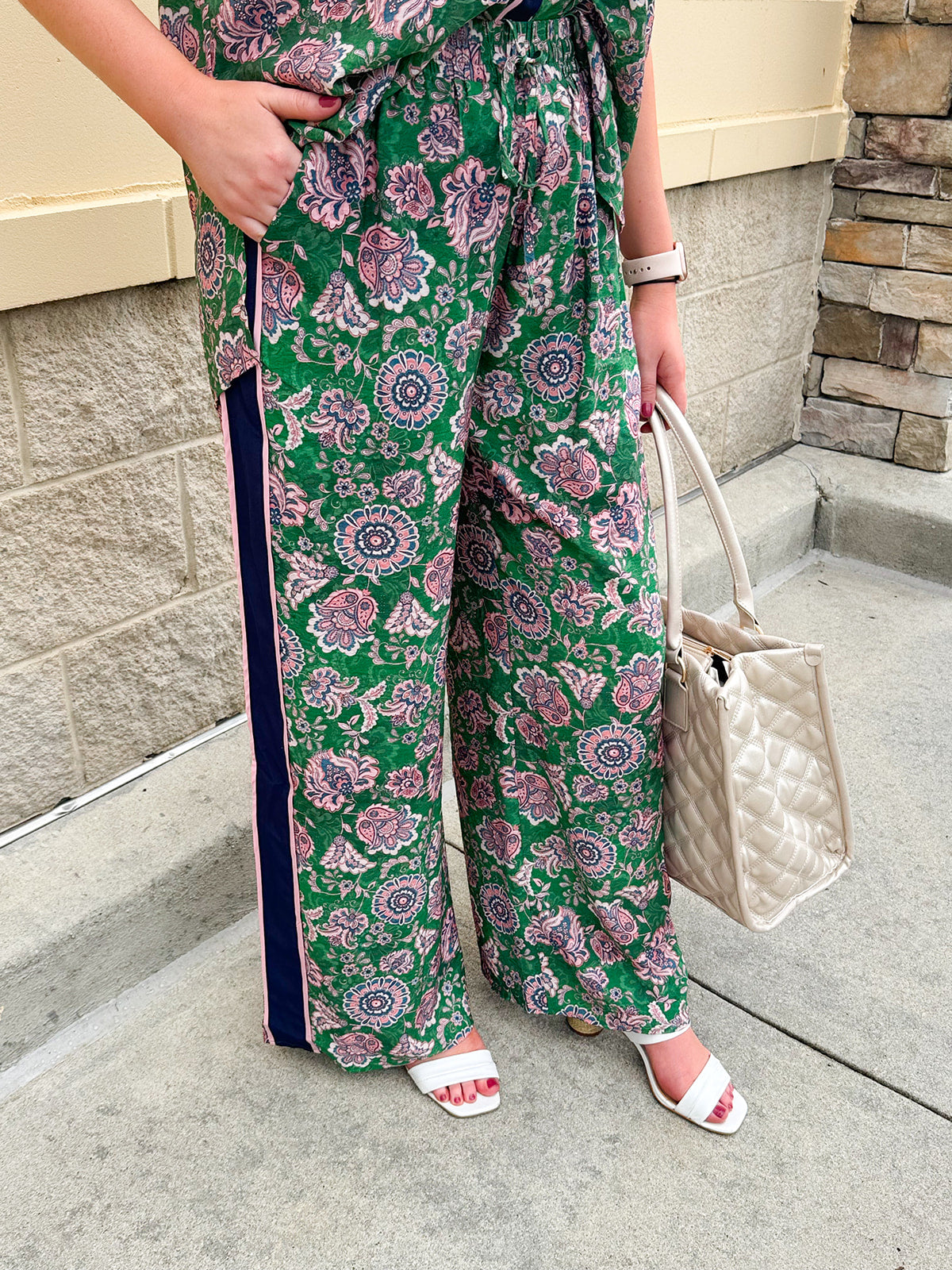 Floral paisley wide-leg pull-on pants in green and pink with contrast side stripe and elastic waist—lightweight and breezy fit