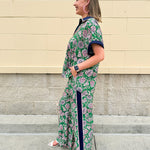 Floral paisley wide-leg pull-on pants in green and pink with contrast side stripe and elastic waist—lightweight and breezy fit