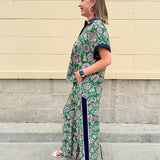 Floral paisley wide-leg pull-on pants in green and pink with contrast side stripe and elastic waist—lightweight and breezy fit