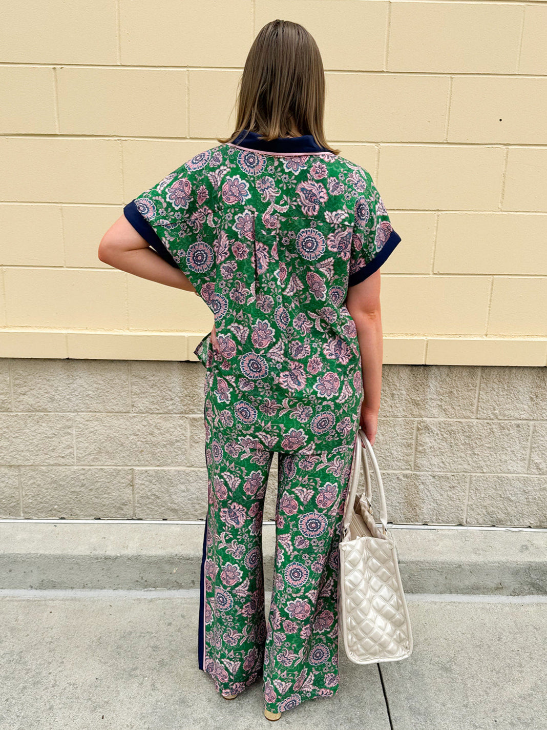 Floral paisley wide-leg pull-on pants in green and pink with contrast side stripe and elastic waist—lightweight and breezy fit