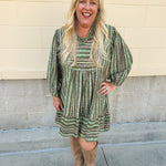 Olive mini dress with ruffled hem, striped trim, and pink/green earthy design