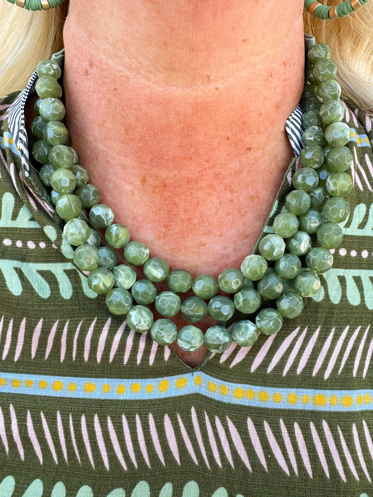 Olive chunky triple-layer bead necklace with faux leather cords and matching magnetic clasp.