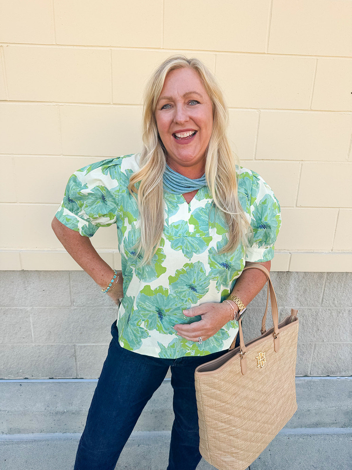 Neutral floral puff sleeve top with v-neck and blue and green print