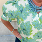 Neutral floral puff sleeve top with v-neck and blue and green print