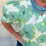 Neutral floral puff sleeve top with v-neck and blue and green print