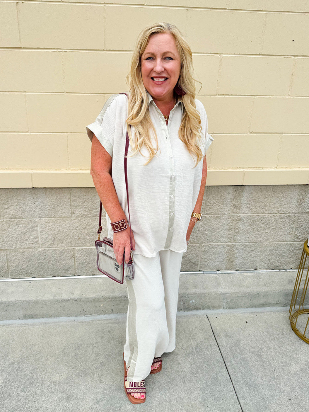 Oatmeal wide leg pants with gold side piping and drawstring waist