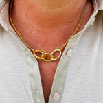 Gold-toned necklace with three statement chain links on a delicate rope chain—elegant, timeless, and made to last.