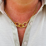 Gold-toned necklace with three statement chain links on a delicate rope chain—elegant, timeless, and made to last.