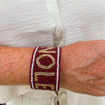 Garnet and gold beaded cuff bracelet featuring the FSU logo, perfect for showing team spirit.