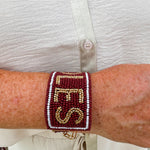 Garnet and gold beaded cuff bracelet featuring the FSU logo, perfect for showing team spirit.