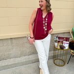 Garnet sleeveless V-neck tank top with pleated neckline detail and a relaxed, lightweight fit—perfect for warm-weather gamedays.