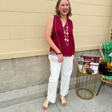 Garnet sleeveless V-neck tank top with pleated neckline detail and a relaxed, lightweight fit—perfect for warm-weather gamedays.
