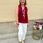 Garnet sleeveless V-neck tank top with pleated neckline detail and a relaxed, lightweight fit—perfect for warm-weather gamedays.