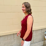 Garnet sleeveless V-neck tank top with pleated neckline detail and a relaxed, lightweight fit—perfect for warm-weather gamedays.