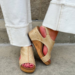 Light gold raffia cork wedges with gold rivets, Velcro heel strap, and a cushioned footbed