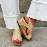 Light gold raffia cork wedges with gold rivets, Velcro heel strap, and a cushioned footbed