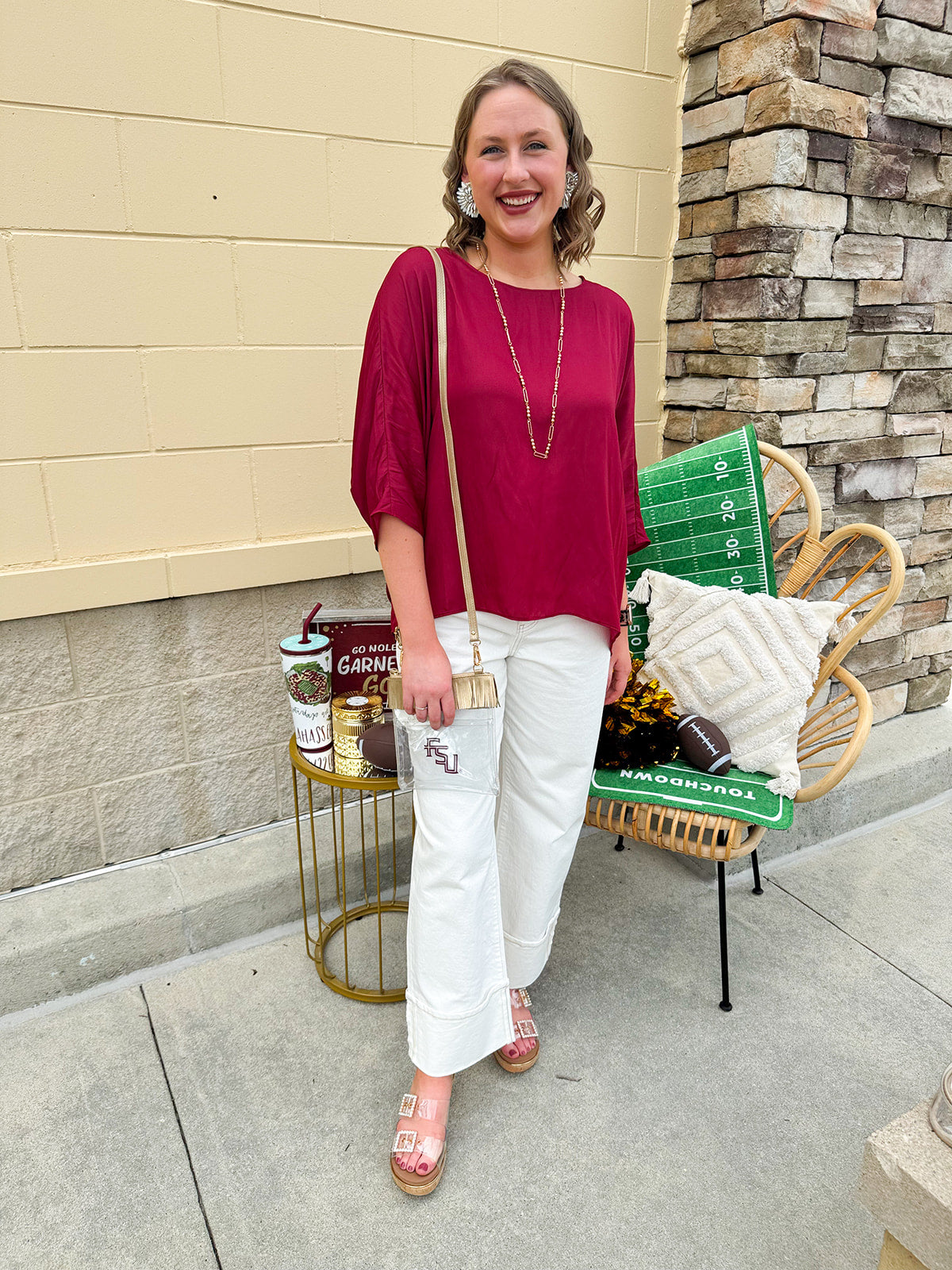 Satin dolman sleeve blouse with a round neckline, shown in a gameday-ready, lightweight and flowy style.