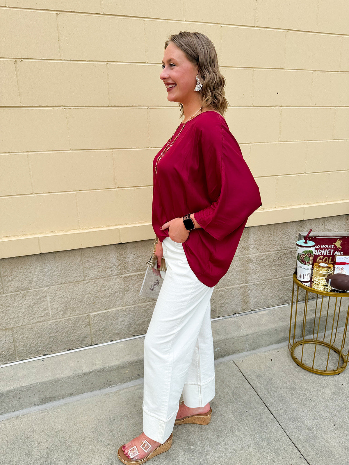 Satin dolman sleeve blouse with a round neckline, shown in a gameday-ready, lightweight and flowy style.