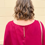 Satin dolman sleeve blouse with a round neckline, shown in a gameday-ready, lightweight and flowy style.