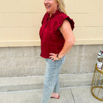 Garnet cotton flutter sleeve top with floral appliqué, ruffle V-neck, and button front—lightweight and perfect for gameday