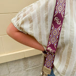Cream and gold striped round-neck top with dolman sleeves and elastic cuffs, styled for summer.