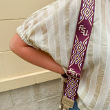 Cream and gold striped round-neck top with dolman sleeves and elastic cuffs, styled for summer.