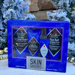 Jack Black facial care gift set with cleanser, scrub, moisturizer, and lip balm