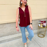 Garnet sleeveless V-neck tank with pleated detail at neckline, made in USA fabric.