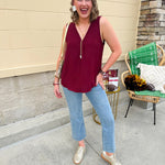 Garnet sleeveless V-neck tank with pleated detail at neckline, made in USA fabric.
