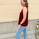 Garnet sleeveless V-neck tank with pleated detail at neckline, made in USA fabric.
