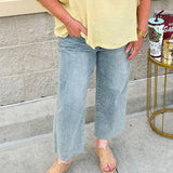 Golden yellow short sleeve blouse with a relaxed fit and dolman sleeves, styled for casual or dressy occasions.