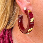 Garnet resin hoop earrings with gold FSU logo charm
