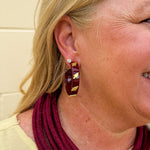 Garnet resin hoop earrings with gold FSU logo charm