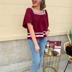 Garnet square neck woven top with white contrast tape on neckline and hem—lightweight and stylish for FSU gameday
