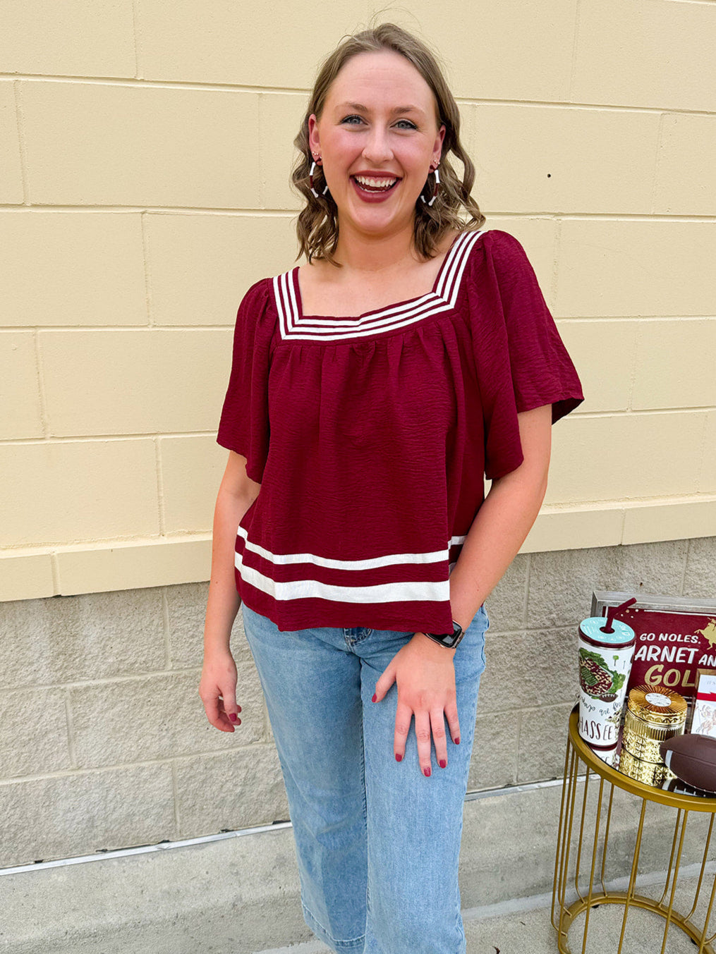 Garnet square neck woven top with white contrast tape on neckline and hem—lightweight and stylish for FSU gameday