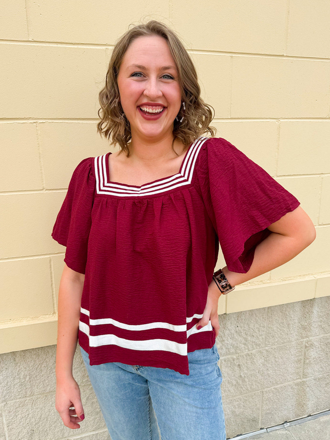 Garnet square neck woven top with white contrast tape on neckline and hem—lightweight and stylish for FSU gameday