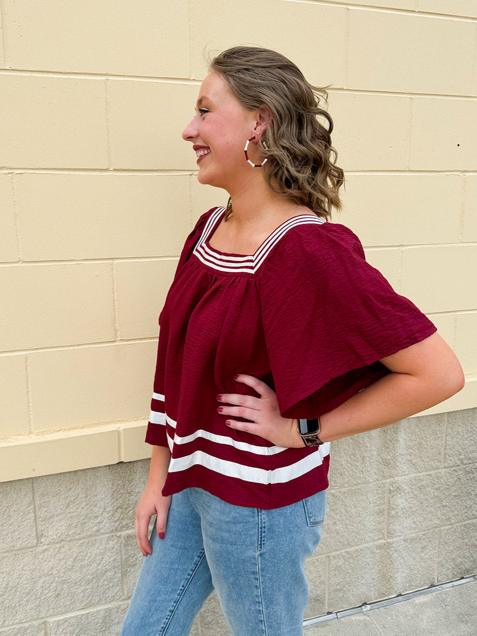 Garnet square neck woven top with white contrast tape on neckline and hem—lightweight and stylish for FSU gameday