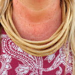 Neutral 8-strand cotton rope necklace with ball-and-eye closure